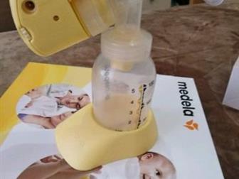    Medela Mini   ,  ,      ,   ,   