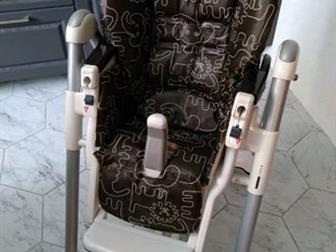 Устойчивый стул для кормления,  Верхнюю столешницу можно мыть в посудомойке,  В сложенном виде занимает мало места,  Есть колесики, поднимать не нужно,  Клеёнку в Кемерово