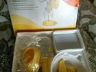 Молокоотсос Medela