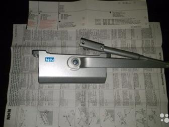       Door Closer,  Reversible right and left hand operation,  Metallic Silver,  Made in Japan!      