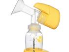 Молокоотсос Medela mini electric