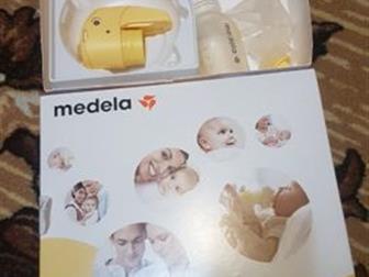  Medela Mini Electric     ,      ,        